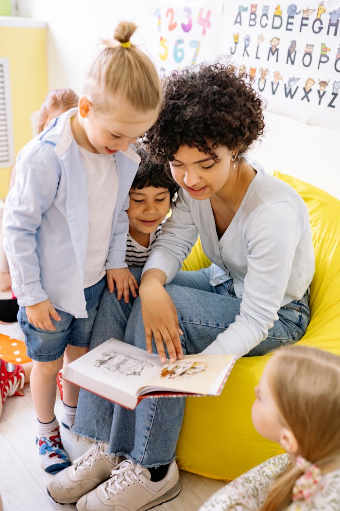 Offerings A teacher engaging young children with a storybook in a colorful classroom setting.